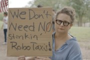 查梦解码特斯拉在得州奥斯汀遭遇抗议活动：反对马斯克Robotaxi计划